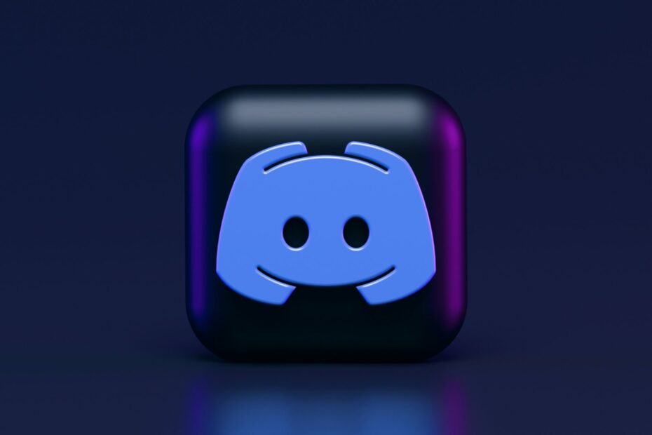 A 3D icon of the Discord logo. The icon features a blue stylized gaming controller with two circular eyes, set against a dark square background with subtle gradient lighting effects. The background transitions from dark blue to a hint of purple, providing a sleek, modern look.