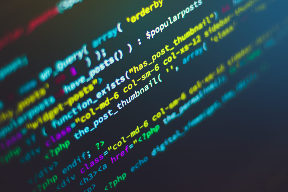 A close-up of colorful programming code displayed on a computer screen. The code includes syntax highlighting with various colors, indicating different elements such as functions, variables, and commands. The image represents software development, coding, and programming, relevant to topics like Python development, web development, and software engineering.